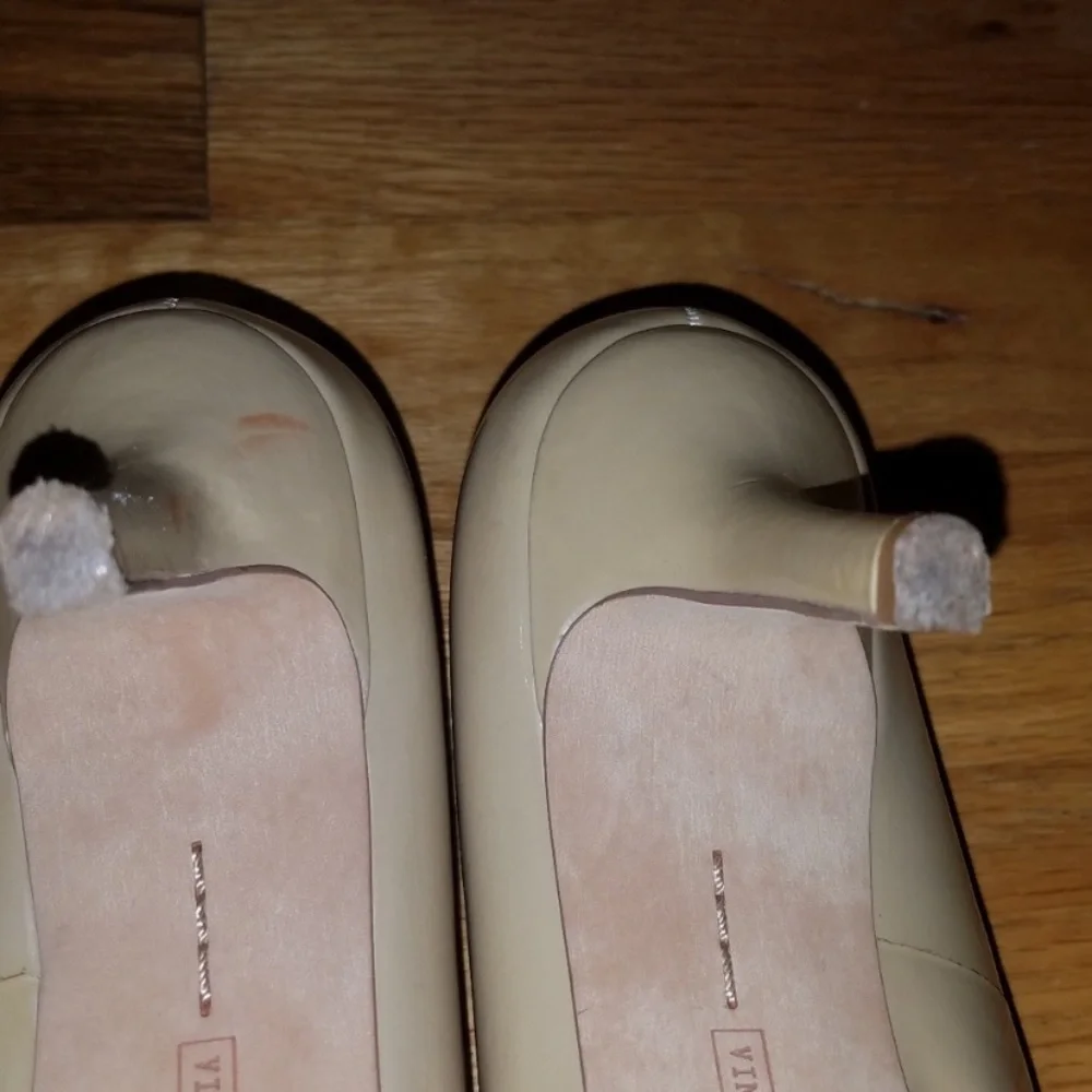 Vince Camuto patent leather nude peep toe pumps